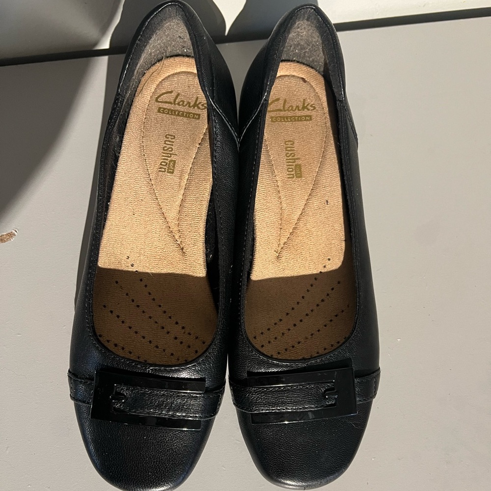 Black Clarks flats with buckle across front women’s 7